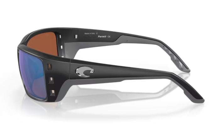 Black Costa wraparound sunglasses with green lenses on a white background