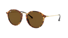 Round Ray-Ban sunglasses with tortoiseshell frame and brown lenses on a white background