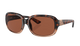 Sunglasses with tortoiseshell frame and brown lenses on a white background