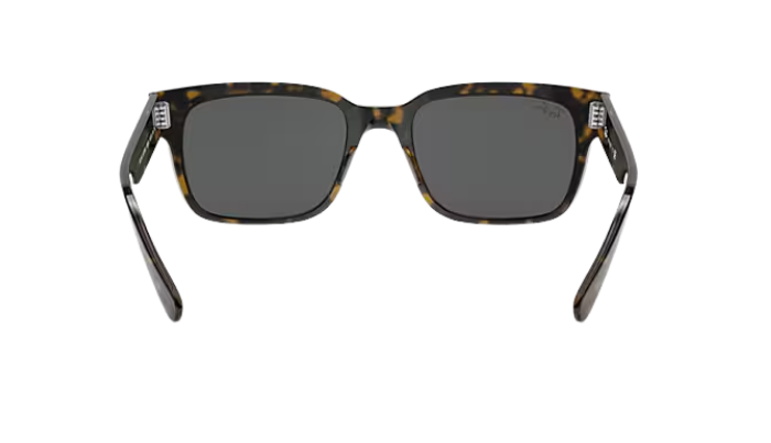 Ray-Ban Sunglasses with tortoiseshell frame and dark lenses on a white background