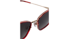Krewe sunglasses with red frames and dark lenses on a white background
