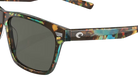 Costa Sunglasses with shiny ocean tortoiseshell frame and gray lenses on a white background