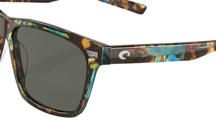 Costa Sunglasses with shiny ocean tortoiseshell frame and gray lenses on a white background