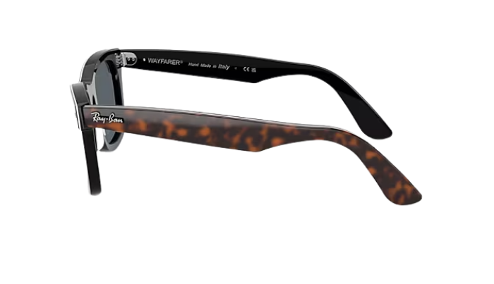 Pair of sunglasses with tortoiseshell frame on a white background
