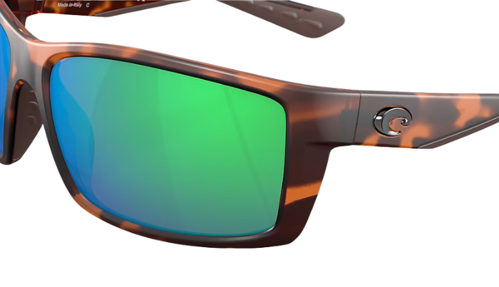 Tortoise shell Costa sunglasses with green mirror lenses on a white background