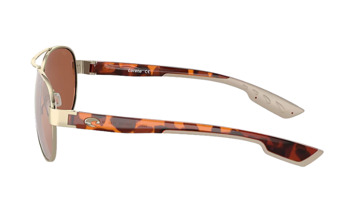 Gold-framed Costa aviator sunglasses with rose gold lenses on a white background