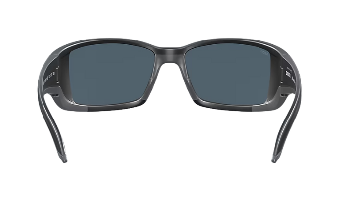 Black Costa wraparound sunglasses with gray lenses and a visible Costa brand logo on a white background