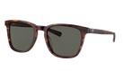 Costa Sunglasses with tortoiseshell frame and gray lenses on a white background