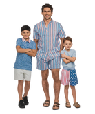 Man and two boys wearing matching USA outfits on a white background