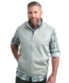 Man wearing a light gray vest WITH ZIPPER over a plaid shirt on a white background HUK GEAR