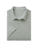 Folded light green striped polo shirt on a white background