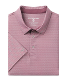 Folded pink polo shirt with a subtle pattern on a white background