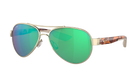 Aviator Costa sunglasses with green lenses and gold frame on a white background