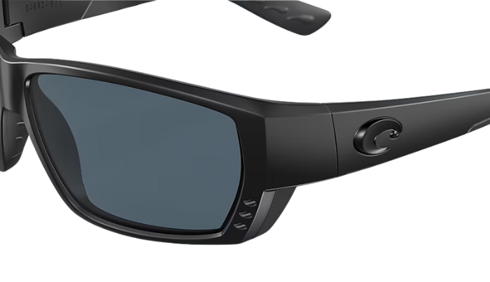 Black Costa wraparound sunglasses with gray lenses on a white background