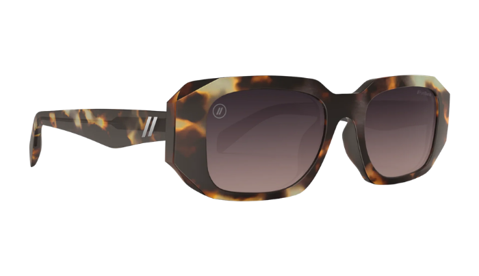 Blenders sunglasses with tortoiseshell frame and dark lenses on a white background