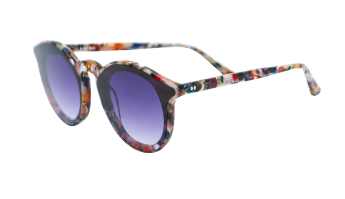 KREWE Sunglasses with colorful frame and purple lenses on a white background