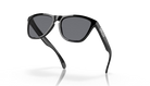 Black sunglasses with dark gray lenses and a white 'CREEX' logo on the temple, shown on a clean white background with a soft reflection.