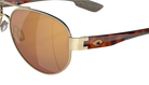 Gold-framed sunglasses with brown lenses on a white background
