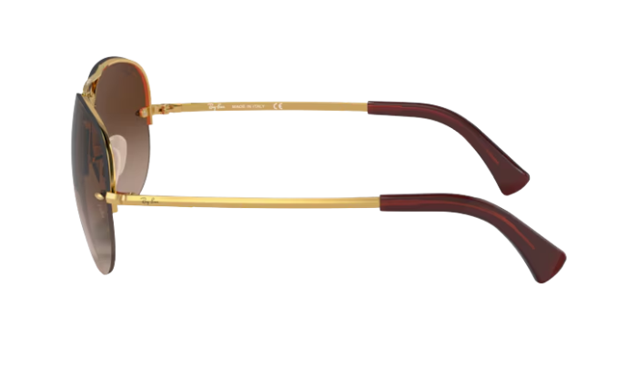 RayBan Aviator sunglasses with gold frame and brown gradient lenses on a white background