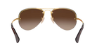 RayBan Aviator sunglasses with gold frame and brown gradient lenses on a white background