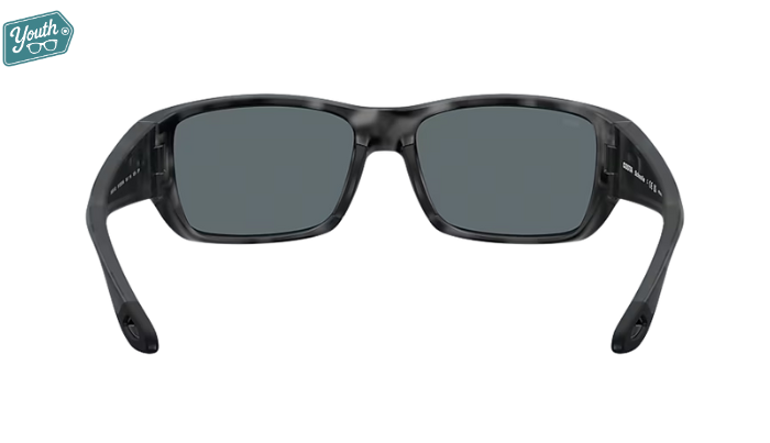 Tiger shark pattern Costa Youth wraparound Sunglasses with blue mirror lenses.