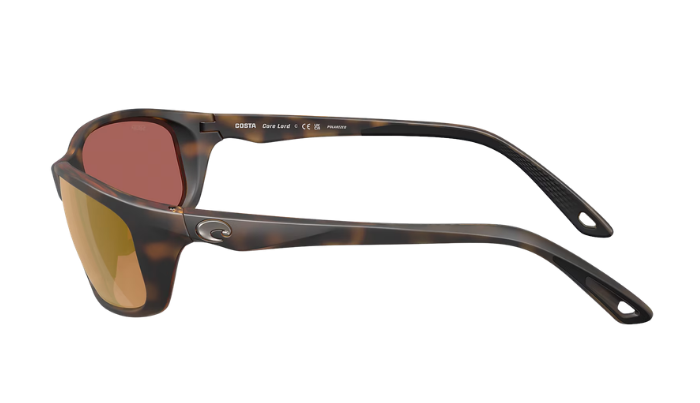 Costa Sunglasses with tortoise frame and polarized gold reflective lenses on a white background