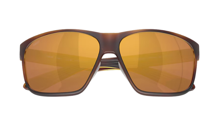 Costa sunglasses with a tortoiseshell frame and polarized gold mirror on a white background