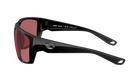Black Costa sunglasses with rose-tinted polarized lenses on a white background