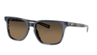 Costa Sunglasses with a blue tortoise frame and polarized copper gradient lenses on a white background