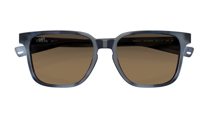 Costa Sunglasses with a blue tortoise frame and polarized copper gradient lenses on a white background