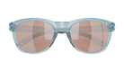 Costa Sunglasses with light blue frames and polarized copper lenses on a white background