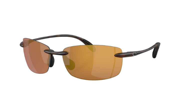 Costa Sunglasses with gold polarized lenses and tortoise frame on a white background