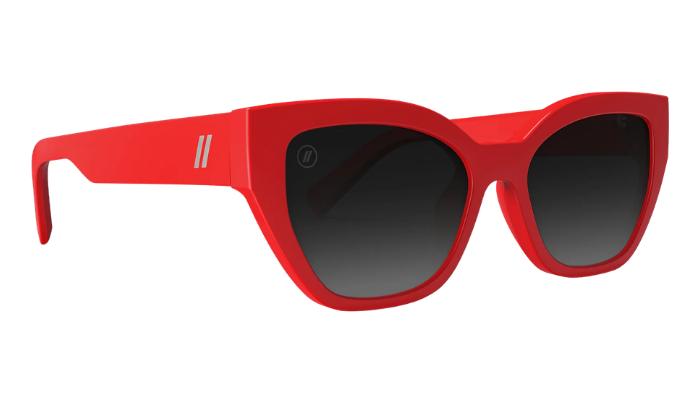 Red sunglasses with dark lenses on a white background