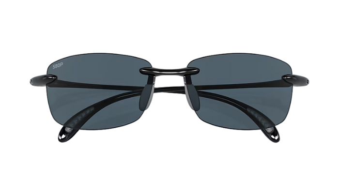 Sunglasses with black frame and dark lenses on a white background
