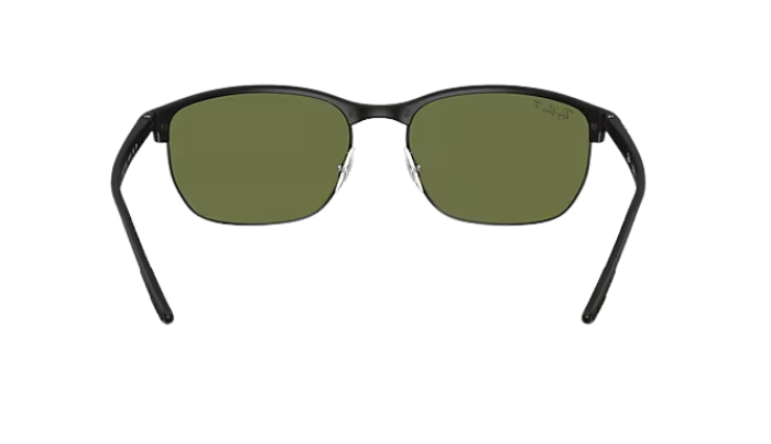 Black Ray-Ban RB4469 sunglasses with green polarized lenses on a white background