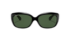 Black sunglasses with green lenses on a white background