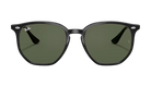 Black Ray-Ban sunglasses with green lenses on a white background