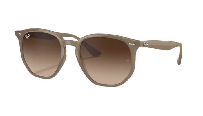 Beige Ray-Ban sunglasses with gradient lenses on a white background