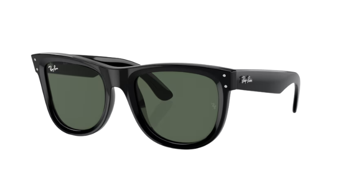 Black sunglasses with green lenses on a white background