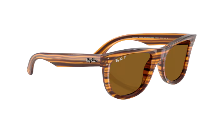 RAY-BAN Sunglasses with tortoiseshell frame and brown lenses on a white background