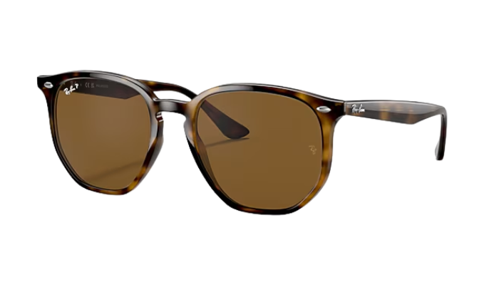 Ray-Ban Sunglasses with tortoiseshell frame and brown lenses on a white background