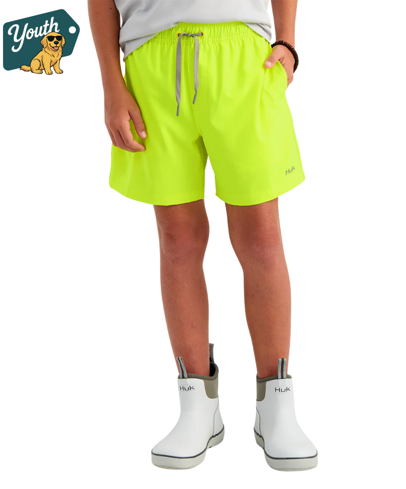 Person wearing bright yellow shorts and white boots on a white background with 'Youth' logo.