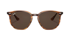 Brown Ray-Ban tortoiseshell sunglasses with dark lenses on a white background