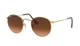 Ray-Ban Round sunglasses with gold frame and brown lenses on a white background