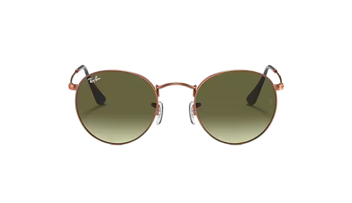 Round sunglasses with rose gold frame and green gradient lenses on a white background