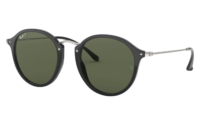 Round Ray-Ban sunglasses with black frames and green polarized lenses on a white background