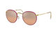 Round Ray-Ban sunglasses with pink gradient lenses and gold frames on a white background