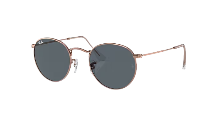 Round Ray-Ban sunglasses with rose gold frame and dark lenses on a white background