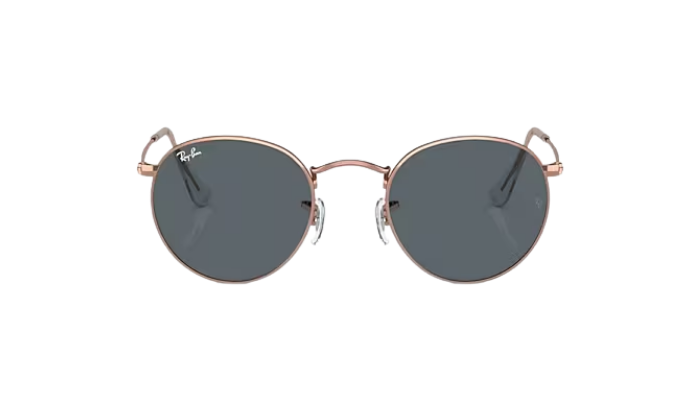 Round Ray-Ban sunglasses with rose gold frame and dark lenses on a white background