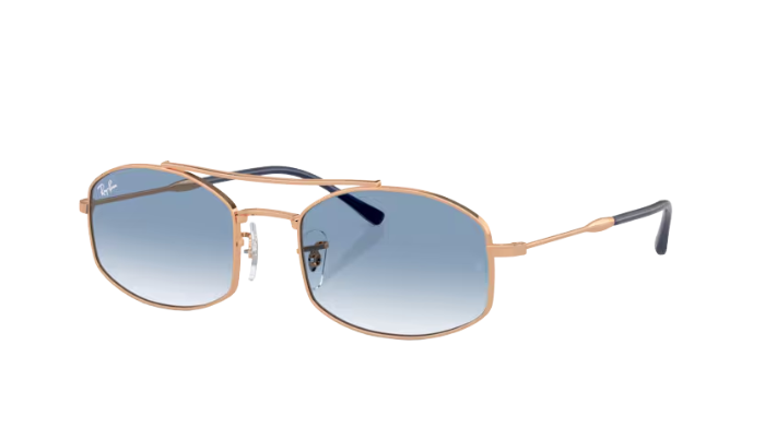 Sunglasses with gold frame and blue gradient lenses on a white background